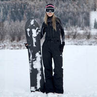 
                  
                    Breathable 3-layer ski bibs with cross-back straps - black bib pants with black top, for skiing and snowboarding
                  
                