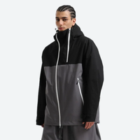 
                  
                    Men's breathable 2L snowboard jacket and pants - black and gray colorblock, on-model front view, for skiing and snowboarding
                  
                