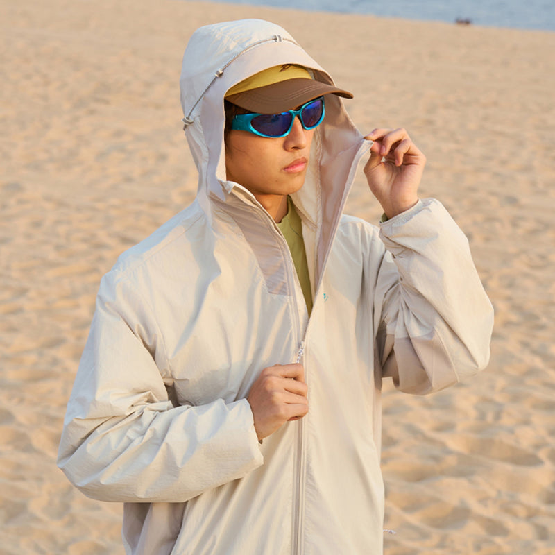 Packable hooded sun jacket for outdoor - cream white sun jacket on men with sunglasses, for hiking and trail walking