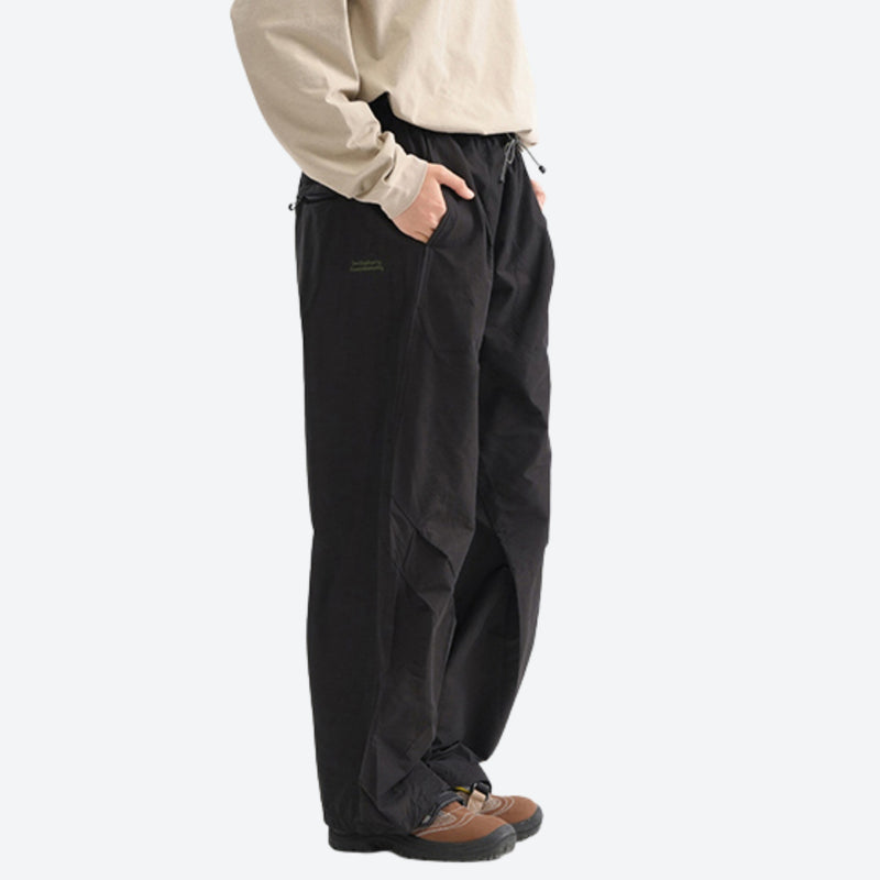 Unisex quick-dry water-repellent hiking pants - black wide-leg hiking pants with cream top, for warm-weather trekking