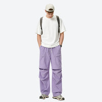 
                  
                    Unisex Coolmax zip-off hiking pants with UPF50 - lavender zip-off hiking pants with white tee, for sunny-weather trekking
                  
                