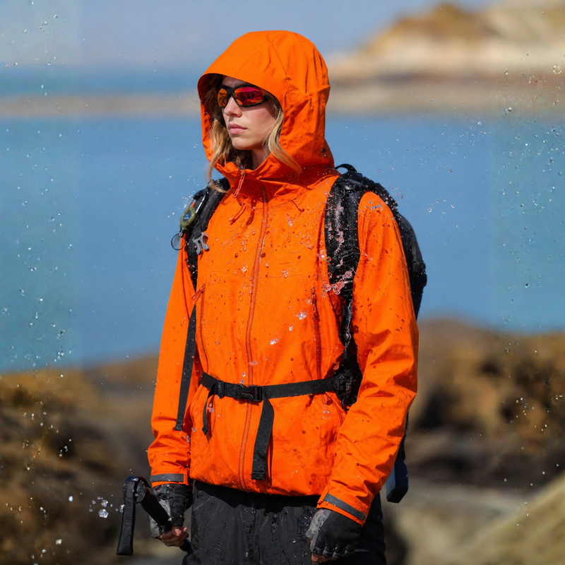 Women's breathable lightweight 3-layer shell with hood - orange hardshell jacket, for cold-weather winter sports