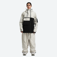 
                  
                    Women's waterproof 2L snow jacket and pants - cream and black colorblock jacket with cream pants
                  
                