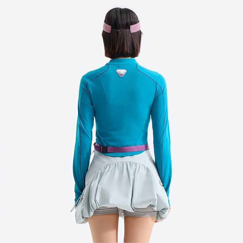 Women's wrinkle-resistant half-zip top - lake blue half-zip long sleeve tee on women with cap, for travel and city walks