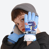 
                  
                    Kids' unicorn and dinosaur snow gloves with fleece - blue dinosaur print kids snow gloves on boy, for resort ski days
                  
                