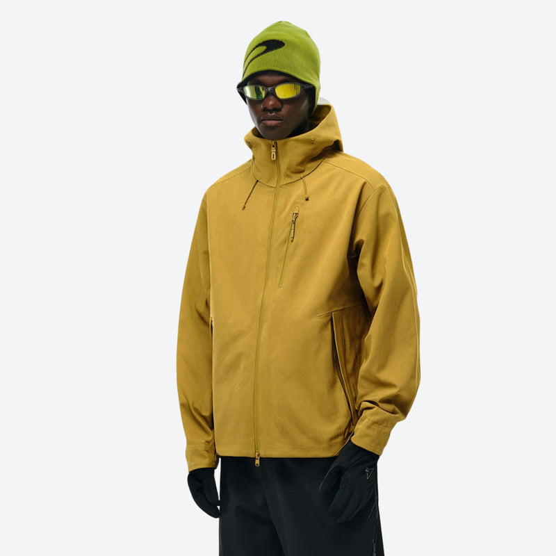 Breathable seamless bonded ski jacket with hood - mustard softshell jacket, on-model front view, for resort and street wear