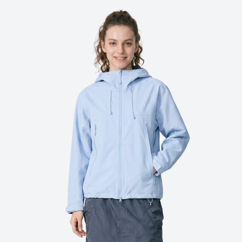 Unisex packable snowboard rain jacket with vents - light blue hardshell jacket, on-model front view, for hiking and travel