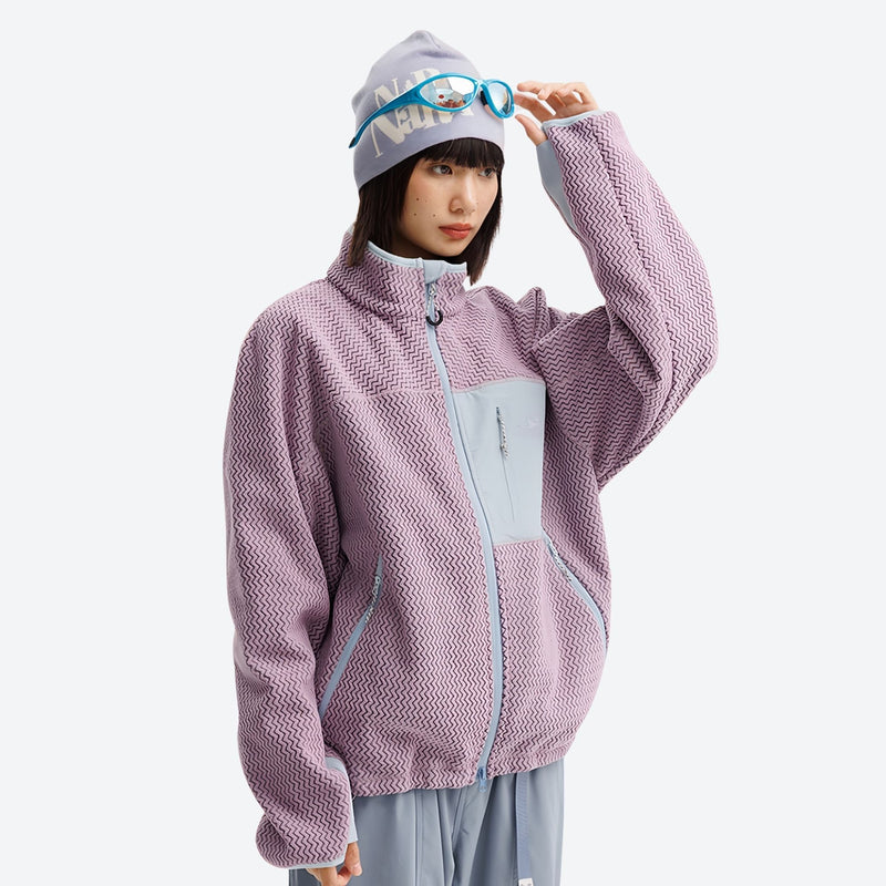 Soft wavy fleece jacket with contrast chest pocket - lavender wavy fleece mid-layer jacket on women with beanie and goggles