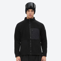
                  
                    Breathable quick-dry fleece liner for layering - black fleece liner jacket on men with helmet, front standing view
                  
                