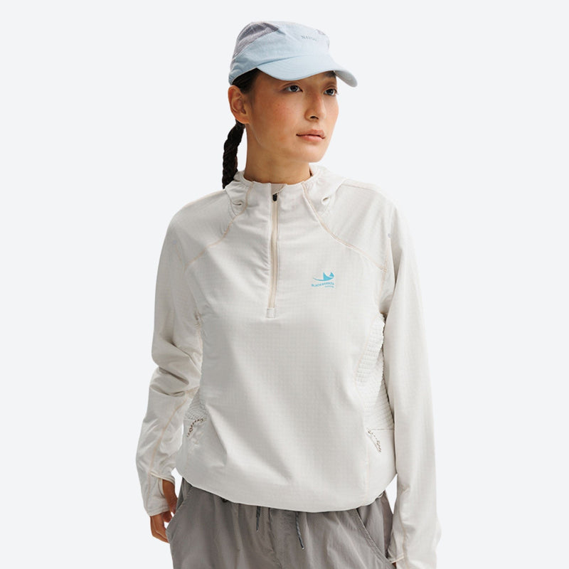Breathable half-zip mid-layer with recycled fabric - white quick-dry lightweight half-zip mid-layer on women with cap