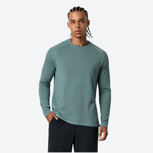 Men's breathable merino blend long-sleeve baselayer - teal merino wool quick-dry base layer top on men, front standing view