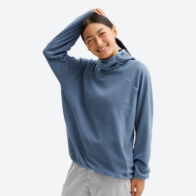 Wrinkle-resistant hooded mid-layer with thumb cuffs - blue hooded mid-layer pullover on women, front view with arm raised