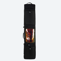 
                  
                    Waterproof snowboard travel bag with wheels - black wheeled snowboard bag, for winter gear transport
                  
                