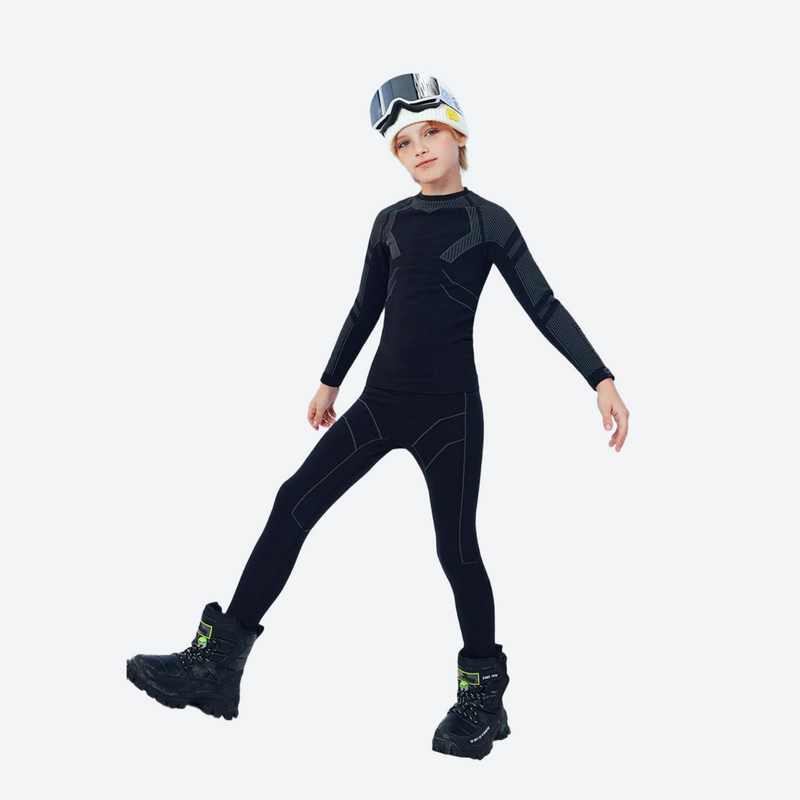 Kids' merino wool base layer suit - black kids merino wool base layer suit with goggles cap and boots, stride pose view