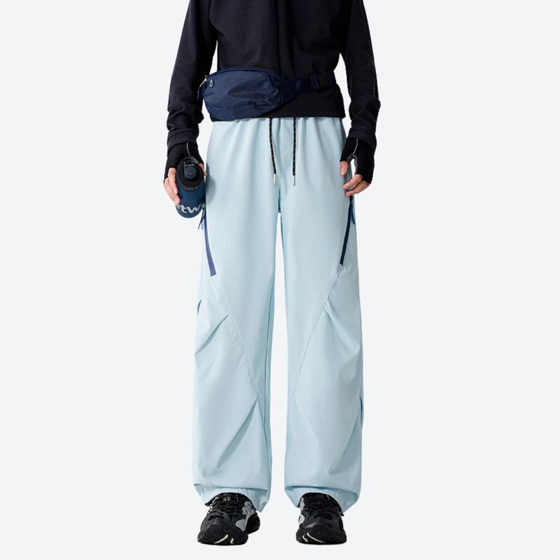 Breathable 650+ fill power duck down snow pants - ice blue down pants with black top, for resort and backcountry days
