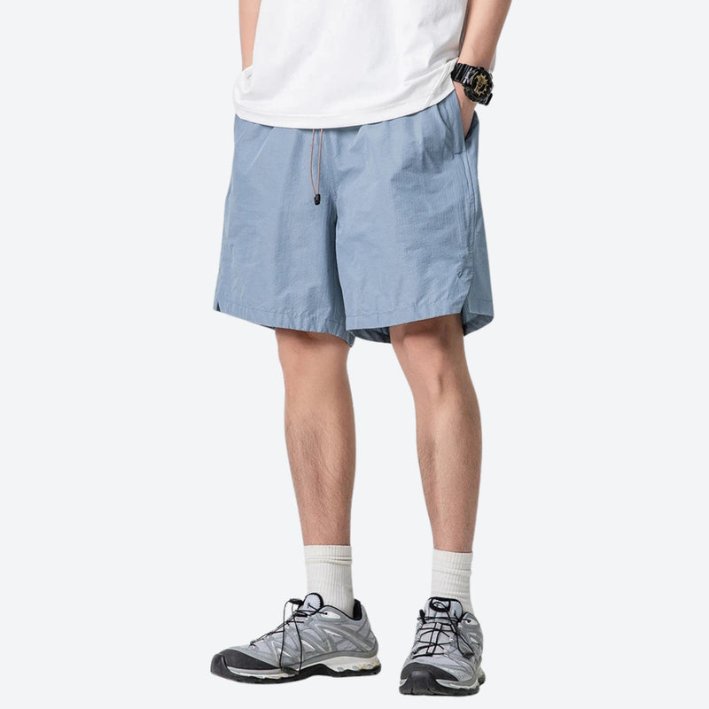 Water-repellent nylon shorts for outdoor - light blue quick-dry shorts with white tee, for hiking and trail walking