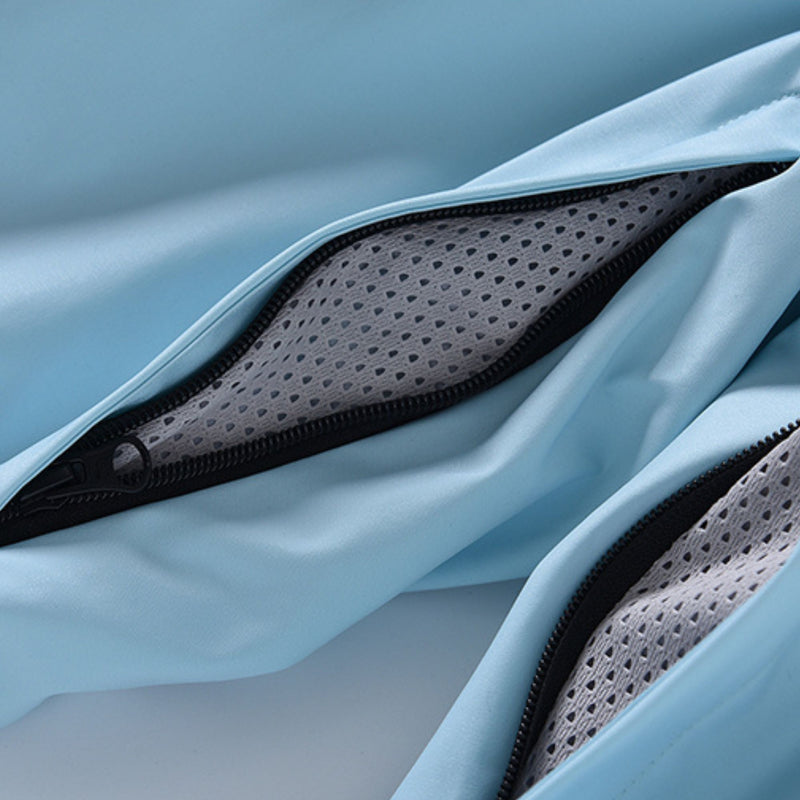 Women's waterproof 3L one-piece snow suit - ice blue, zip vent mesh close-up detail, for cold-weather winter sports