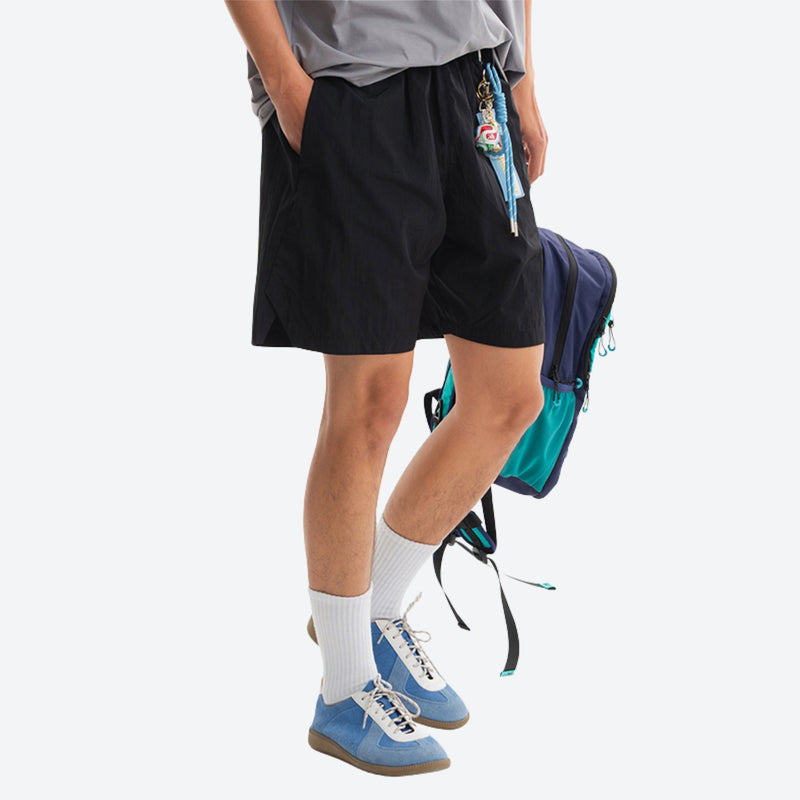 Breathable water-repellent shorts for outdoor - black water-repellent shorts with gray tee, for warm-weather trekking