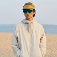 
                  
                    Lightweight water-repellent sun protection jacket - cream white sun jacket on men with sunglasses, for travel and city walks
                  
                