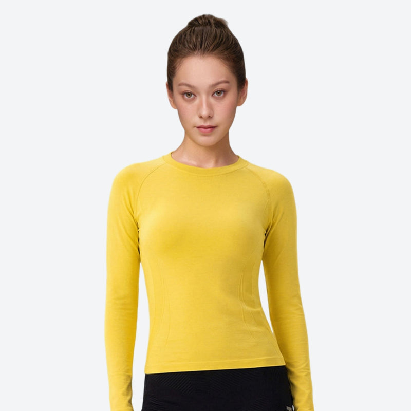 Breathable merino wool base layer top for outdoor - yellow merino wool baselayer long-sleeve on women, front standing view