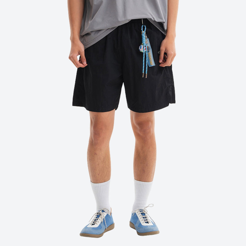 Unisex water-repellent quick-dry shorts - black water-repellent shorts with gray tee, for travel and city walks