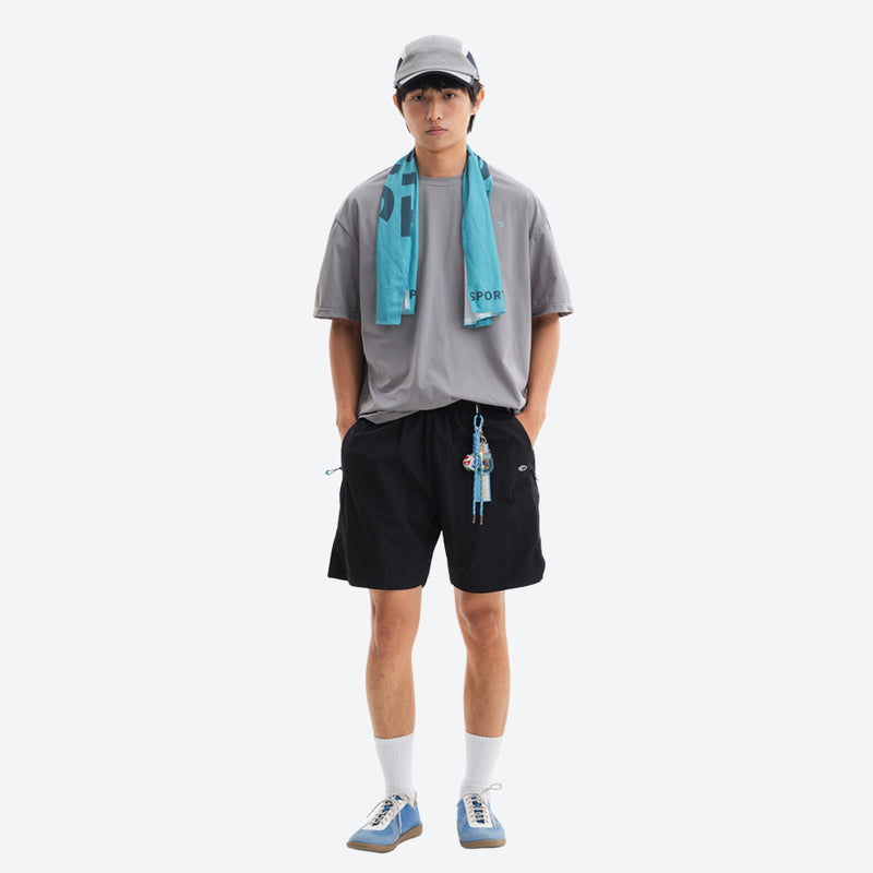 Lightweight trail shorts with back pocket - black water-repellent shorts with gray tee, for camping and outdoor weekends
