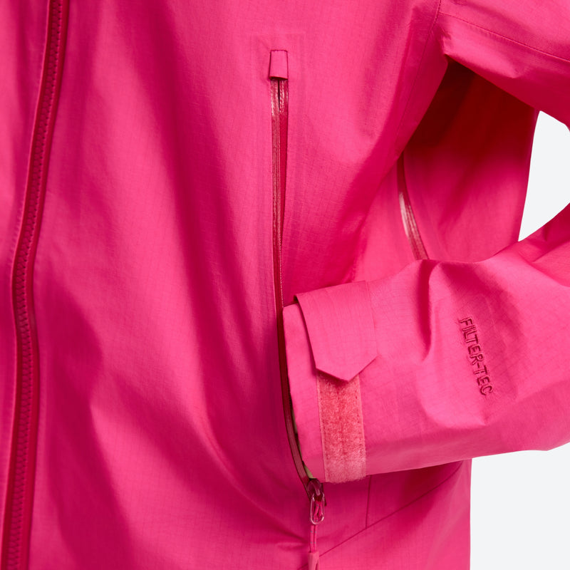 Women's waterproof 3L lightweight hardshell jacket - pink, side pocket close-up detail, for hiking and mountaineering