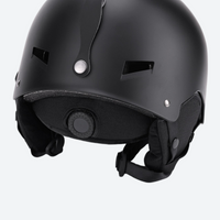 
                  
                    Lightweight ski helmet with integrated goggle look - black snow helmet, back three-quarter view, for winter mountain trips
                  
                
