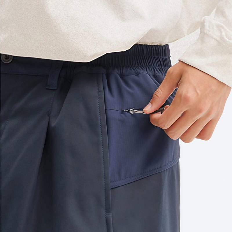 Breathable water-repellent camo softshell set - navy, waist pocket close-up with hand, for resort and street wear