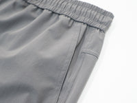 
                  
                    Water-repellent cargo hiking pants with drawcord hem - gray wide-leg cargo pants, for sunny-weather trekking
                  
                