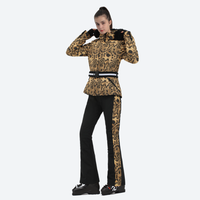 
                  
                    Women's waisted waterproof ski jacket - gold paisley slim fit ski jacket with fur collar, for winter mountain trips
                  
                
