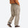Breathable water-repellent trekking pants with vents - tan pants with orange top, for hiking and trekking