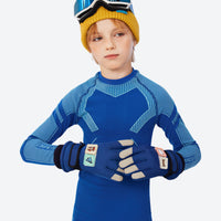 
                  
                    Kids' printed ski gloves with wrist strap - navy kids snow gloves on boy, front standing wear view, for snow sports weekends
                  
                