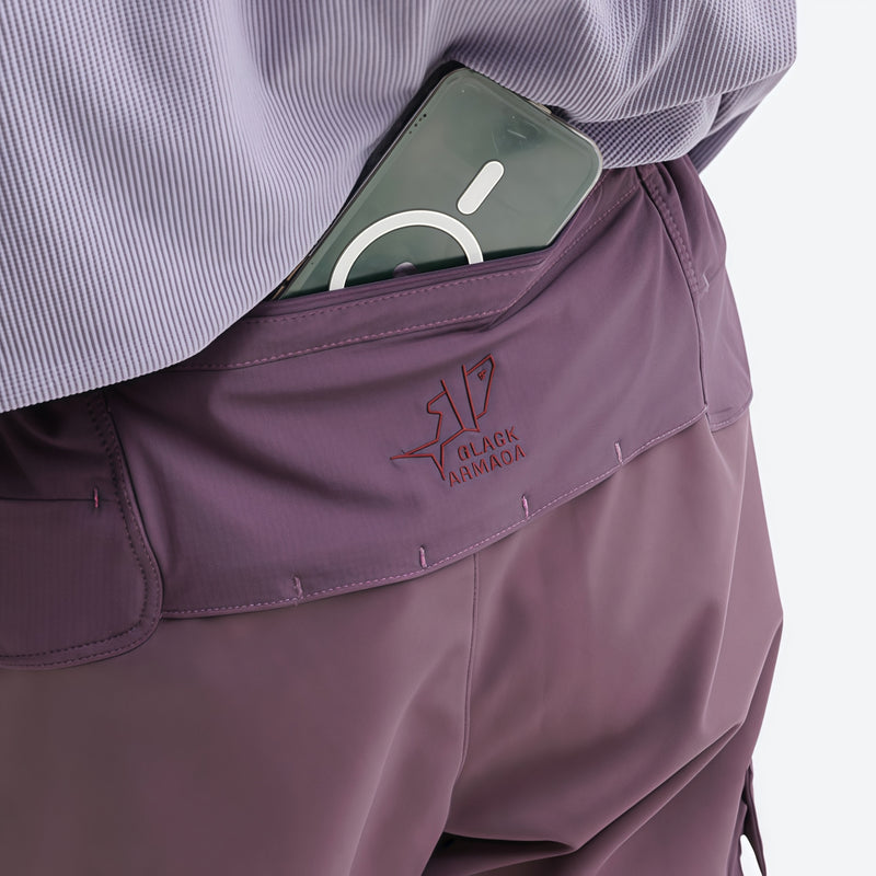 Unisex lightweight softshell outdoor pants - purple, waist pocket close-up with phone, for resort and street wear