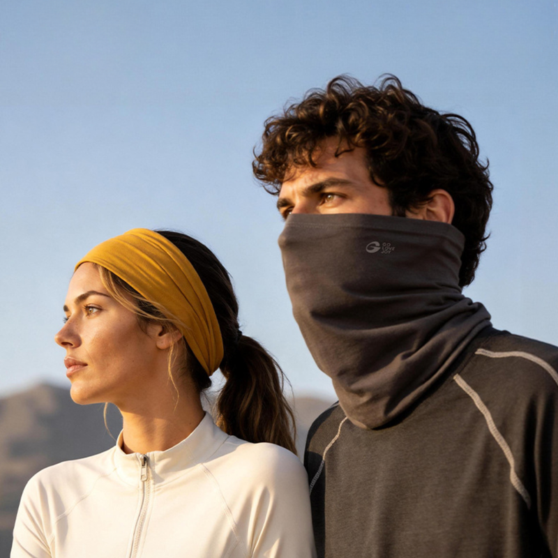 Antibacterial merino wool neckwarmer tube - mustard and gray merino neckwarmer on couple, for cycling and commuting