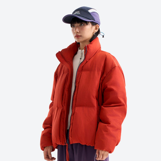 Warm windproof puffer jacket for cold days - red windproof stand-collar down jacket on women with cap