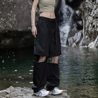 
                  
                    Women's breathable convertible pants with zip legs - black zip-off hiking pants with olive top
                  
                