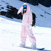 
                  
                    Women's 2-layer snowboard jacket and bibs - light pink jacket with light pink pants, for resort and street wear
                  
                