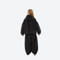 
                  
                    Kids breathable snowboard jacket and bib pants set - black, kids on-model back view, for kids skiing and snowboarding
                  
                
