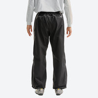 
                  
                    Unisex waterproof softshell cargo hiking pants - black pants with gray top, on-model front view, for camping and travel
                  
                