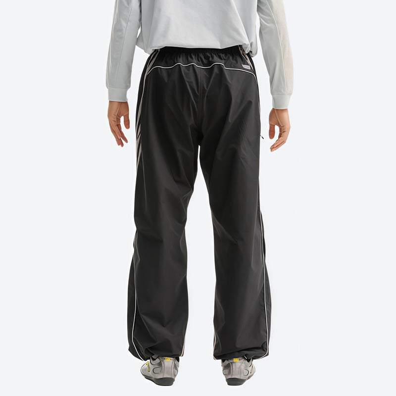 Unisex waterproof softshell cargo hiking pants - black pants with gray top, on-model front view, for camping and travel