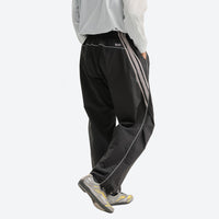 
                  
                    Breathable water-repellent trekking pants with vents - black pants with gray top, for outdoor spring and autumn wear
                  
                