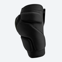 
                  
                    Padded protection top shorts and knee pads - black impact protection knee pad, side view, for snow sports beginners
                  
                