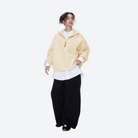 
                  
                    Soft boxy fleece sweater for cold days - cream boxfleece half-zip sweatshirt on women over white shirt
                  
                