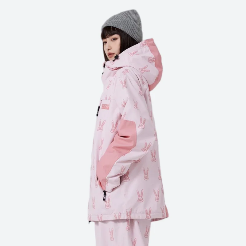 Women's waterproof 2L snow jacket and pants - pink rabbit print jacket, on-model side view, for cold-weather winter sports