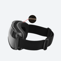 
                  
                    Ventilated spherical ski snow goggles - black frame with strap, three-quarter side view, for ski touring and alpine runs
                  
                