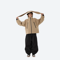
                  
                    Kids 3L waterproof snow jacket and pants suit - tan jacket with black pants, for kids skiing and snowboarding
                  
                