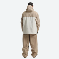 
                  
                    Men's waterproof 2L snow jacket and pants - tan and cream colorblock jacket with tan pants, for resort and street wear
                  
                