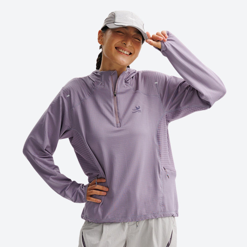 Breathable half-zip mid-layer with recycled fabric - lavender quick-dry lightweight half-zip mid-layer on women with cap