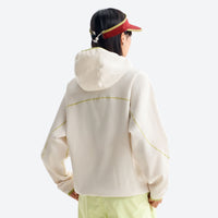 
                  
                    Breathable comfort mid-layer hoodie - cream hooded mid-layer pullover on women with visor, for layering in cool weather
                  
                